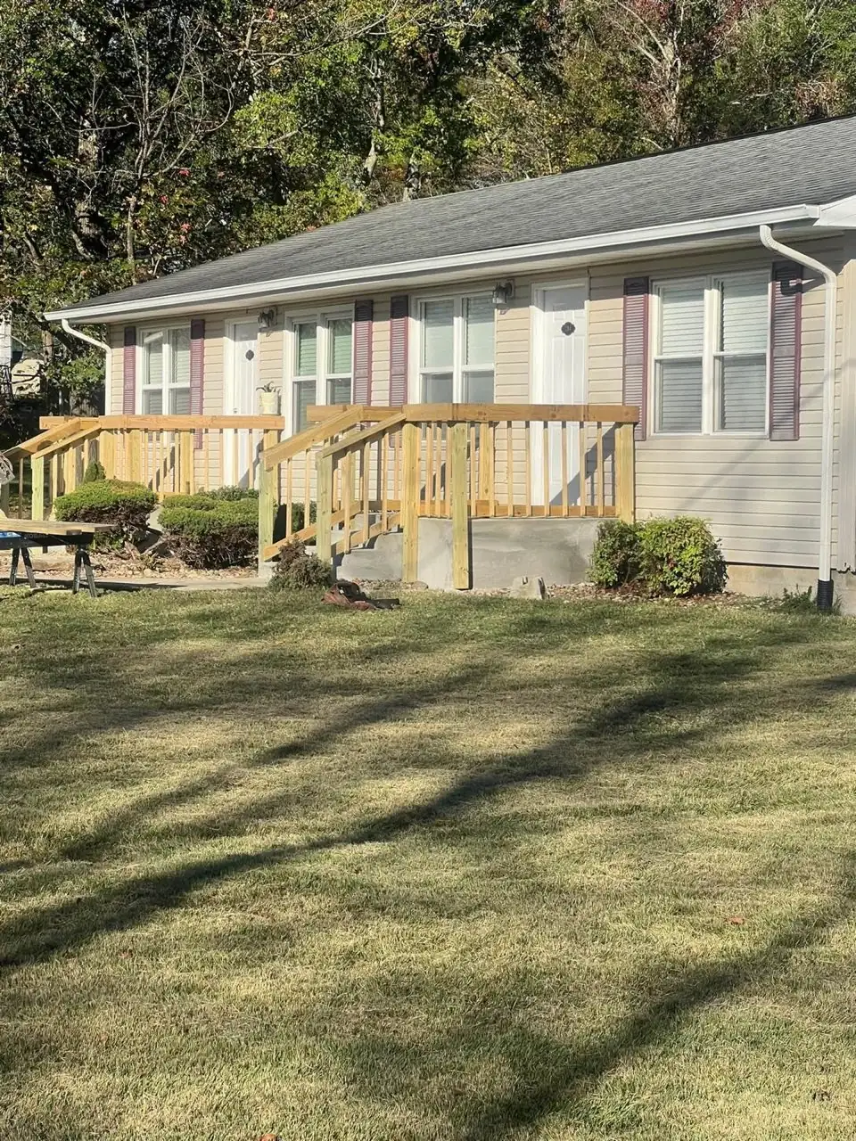After: Brand new custom built pressure-treated timber deck with stairs and safety railings