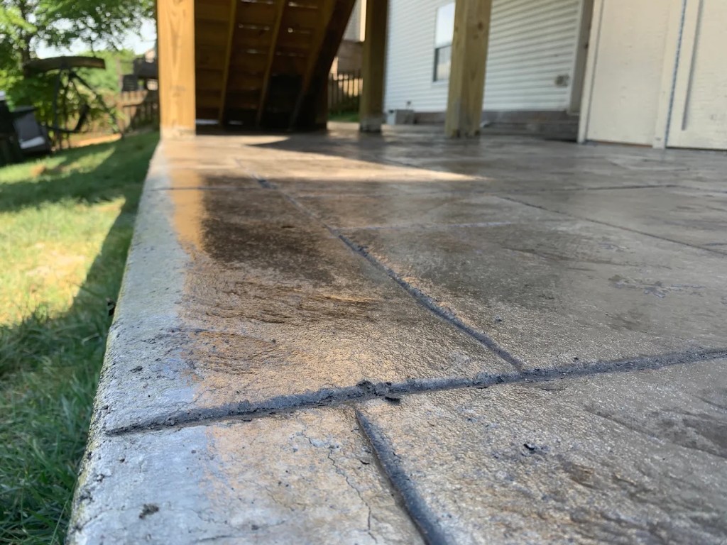 Close-up of stamped concrete joints and stone texture