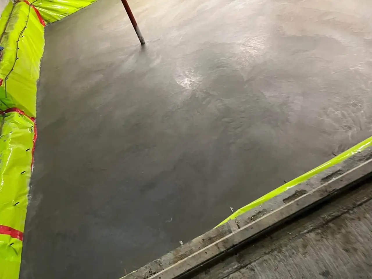 Freshly floated indoor workshop concrete slab