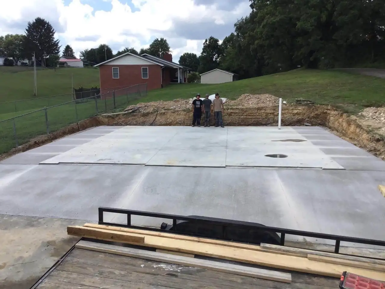 Large outdoor monolithic concrete slab poured for a garage workshop in London KY